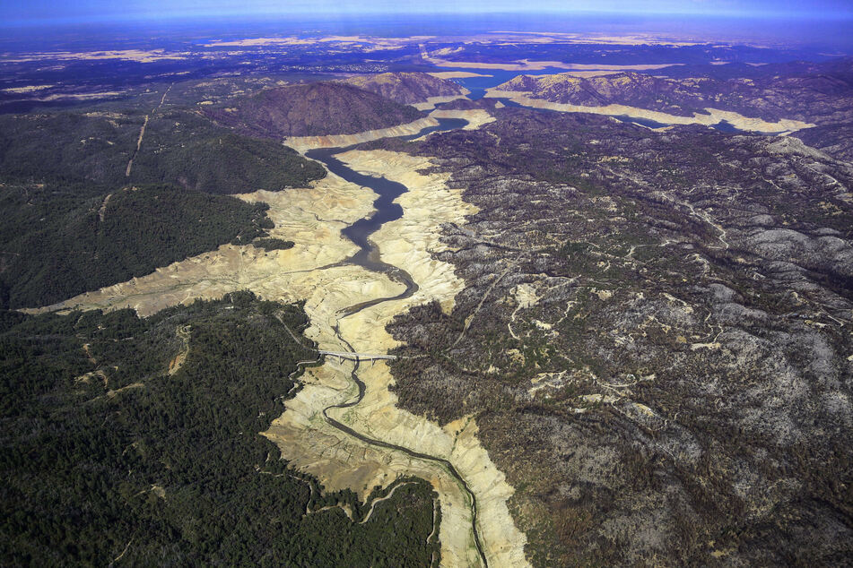 An aerial photo shows South Fork Feather River at Lake Oroville as it continues to dry up during the California drought.