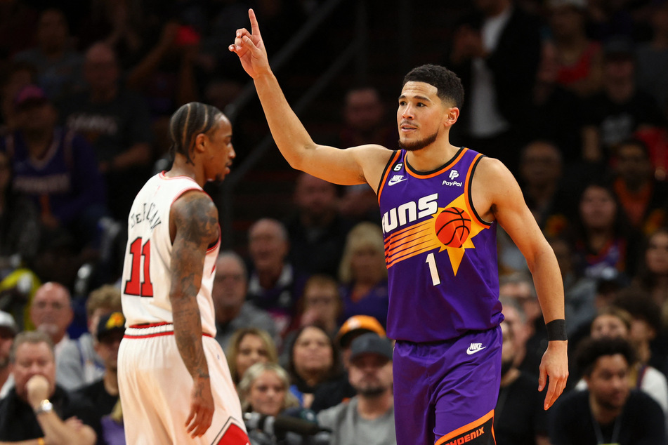 Phoenix Suns guard Devin Booker reacts against the Chicago Bulls at Footprint Center.