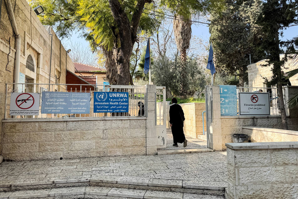 Palestinian women enter an UNRWA Jerusalem Health Center in Jerusalem's Old City on January 27, 2025.