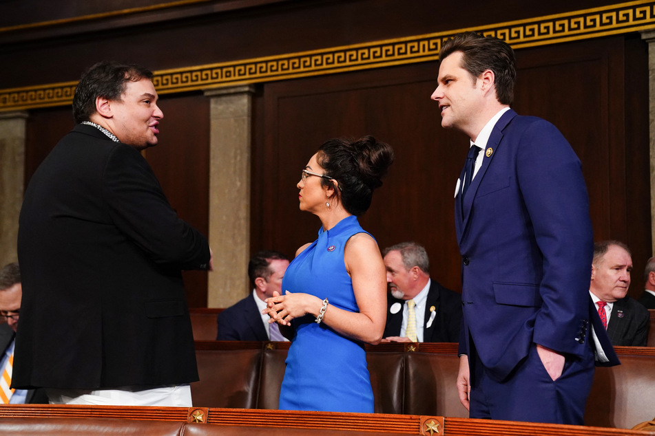 Former Congressman George Santos (l.) chatting with Representatives Lauren Boebert (c.) and Matt Gaetz ahead of the State of the Union address on March 7, 2024.