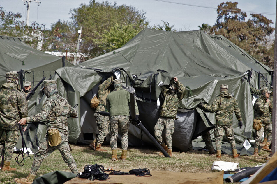 Mexican soldiers rushed Thursday to set up emergency shelters near the border with the US ahead of President Donald Trump's threatened mass deportations.