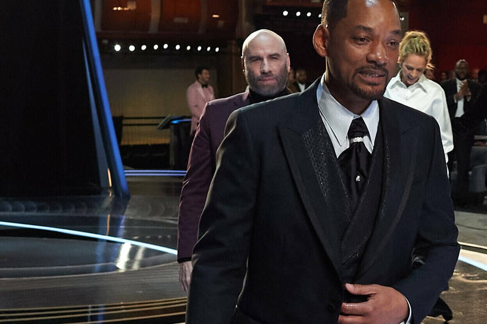 Will Smith apologizes to Chris Rock as Academy Awards promises "consequences"