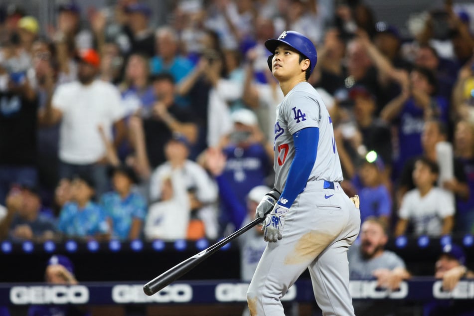 Los Angeles Dodgers designated hitter Shohei Ohtani watches his two-run home run against the Miami Marlins during the seventh inning at loanDepot Park.