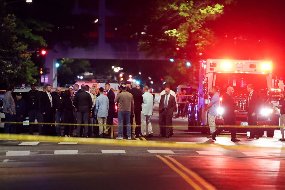 An ambulance is parked at the site where two Israeli embassy staff were shot dead near the Capital Jewish Museum in Washington DC.