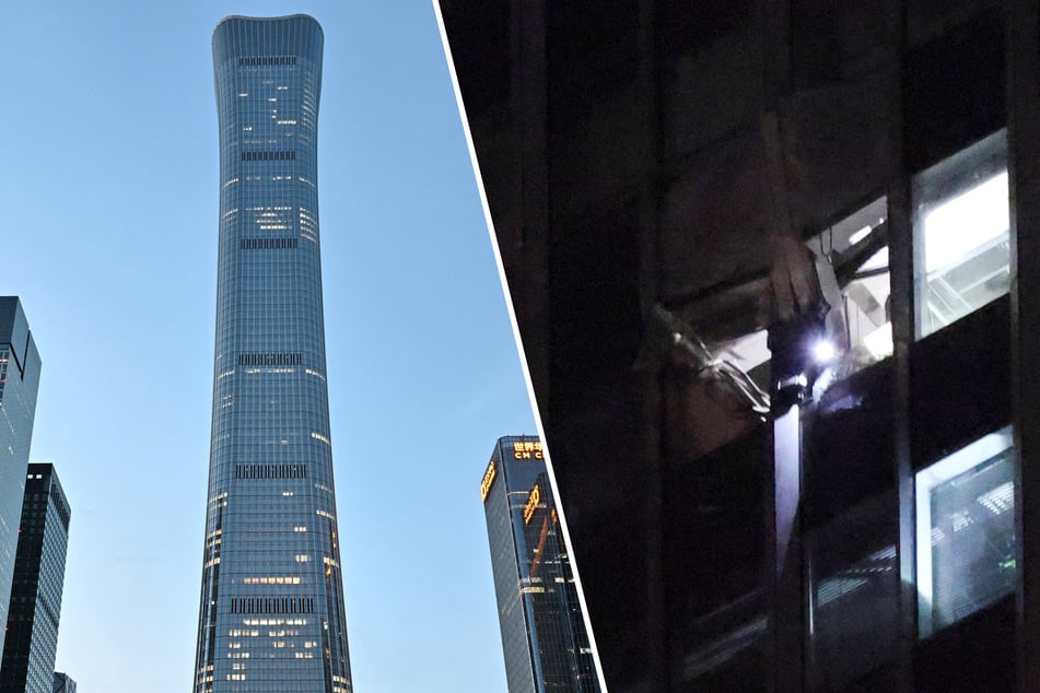 Plane debris was spotted at the base of Beijing's tallest building after a small aircraft reportedly crashed into the skyscraper.