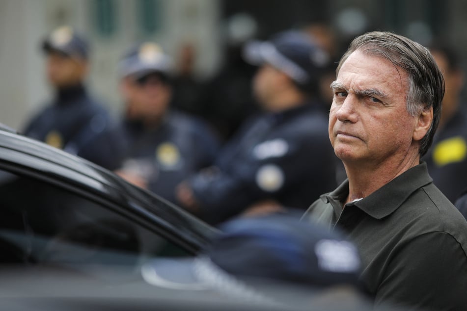 Former Brazilian President Jair Bolsonaro leaves the DF Star hospital in Brasilia on September 14, 2025, after undergoing a series of medical examinations.