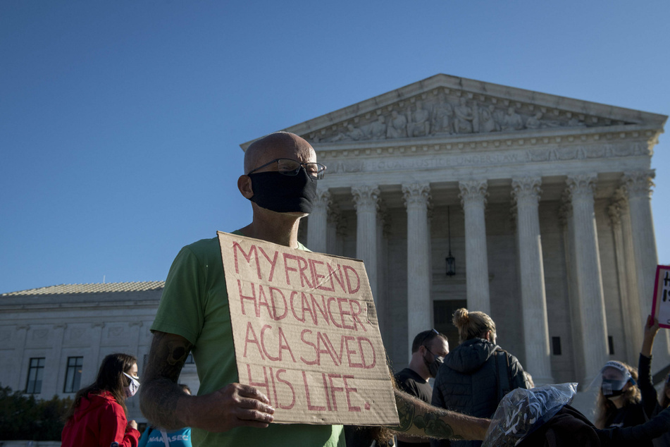 Protesters gathered outside the Supreme Court in support of the Affordable Care Act.
