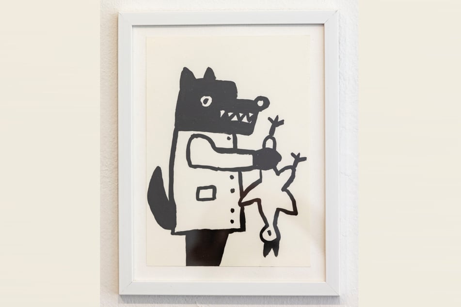 Das Huhn ist gefangen: eine Tuschezeichnung der Wolfs-Serie von Holger John.