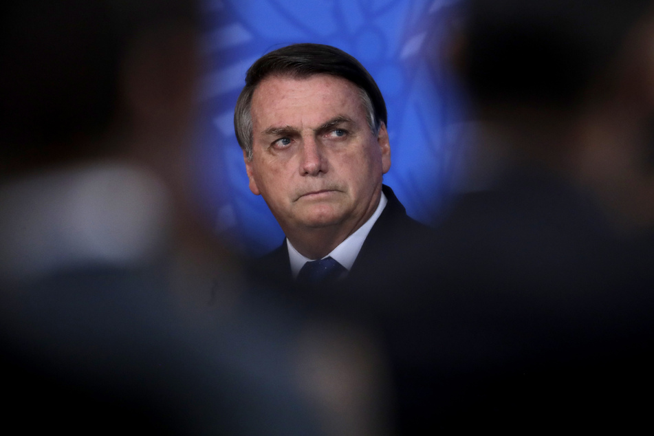 Jair Bolsonaro, der Präsident von Brasilien, verglich das Coronavirus häufig mit einer "leichte Grippe".