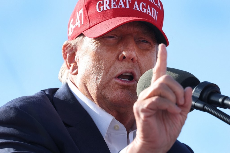 Presumptive Republican presidential nominee Donald Trump speaks to supporters during a rally at the Dayton International Airport on March 16, 2024, in Vandalia, Ohio.