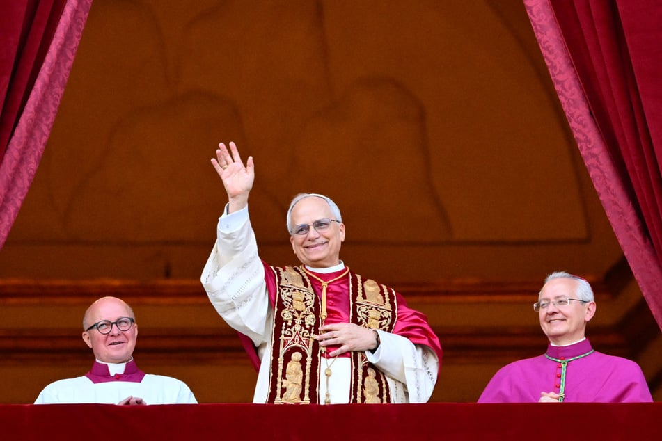 In his address to the crowds Thursday, Pope Leo XIV (c.) echoed his predecessor Francis with a call for peace and urging a "missionary Church".