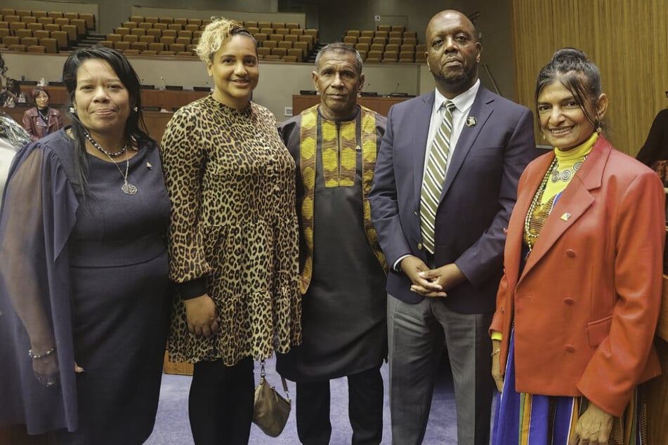 The Bonerian delegation poses with Chair Martin Kimani (second from r.) during the fourth session of the United Nations Permanent Forum on People of African Descent.