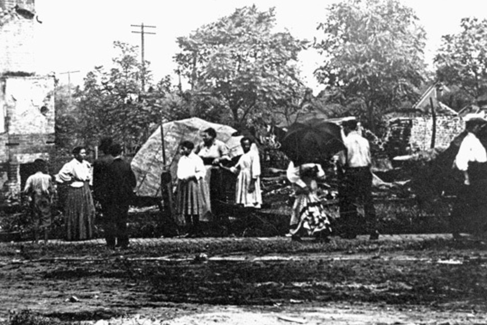 Survivors of the 1908 race massacre in Springfield, Illinois, are pictured in the aftermath of the attack.