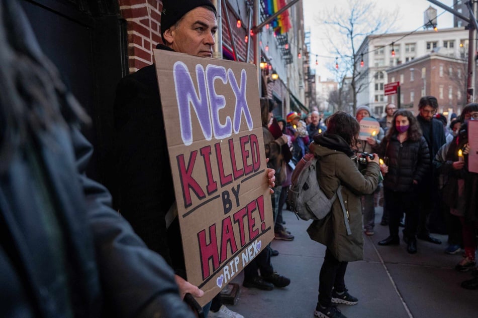 Mourners gathered outside Stonewall Inn in New York for a vigil for Nex Benedict, Oklahoma teenager who died following a fight in a high school bathroom.
