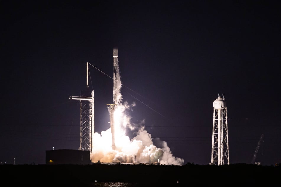 A SpaceX Falcon 9 rocket carrying a classified X-37B military space plane lifts off at Kennedy Space Center in Florida on August 21, 2025.