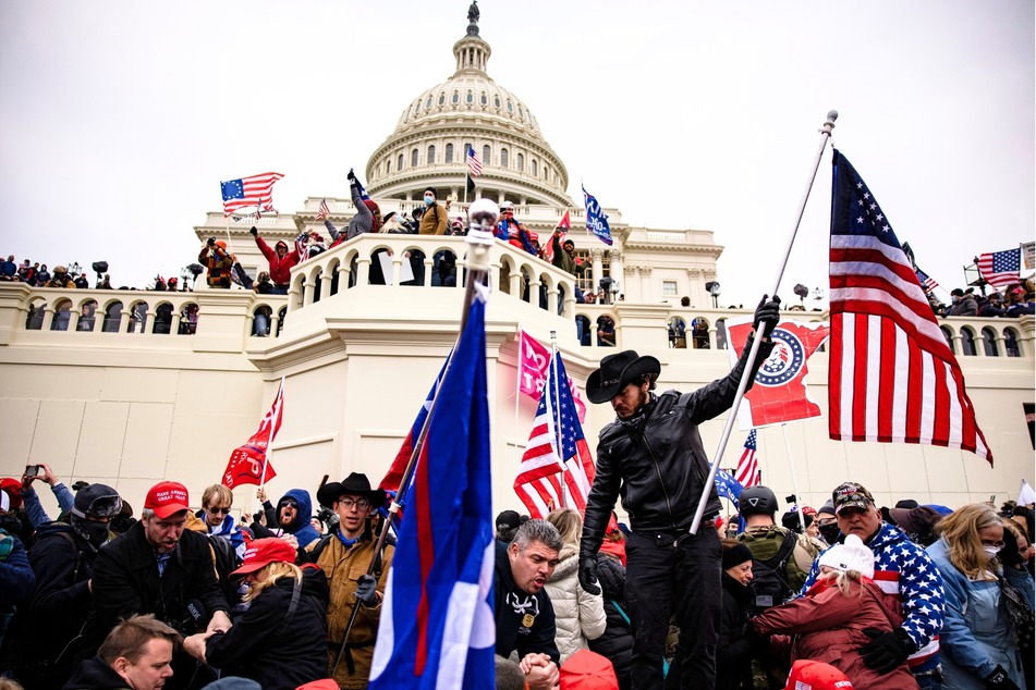 Pro-Donald Trump supporters storm the US Capitol following the former president's "Stop the Steal" rally in Washington DC on January 6, 2021.