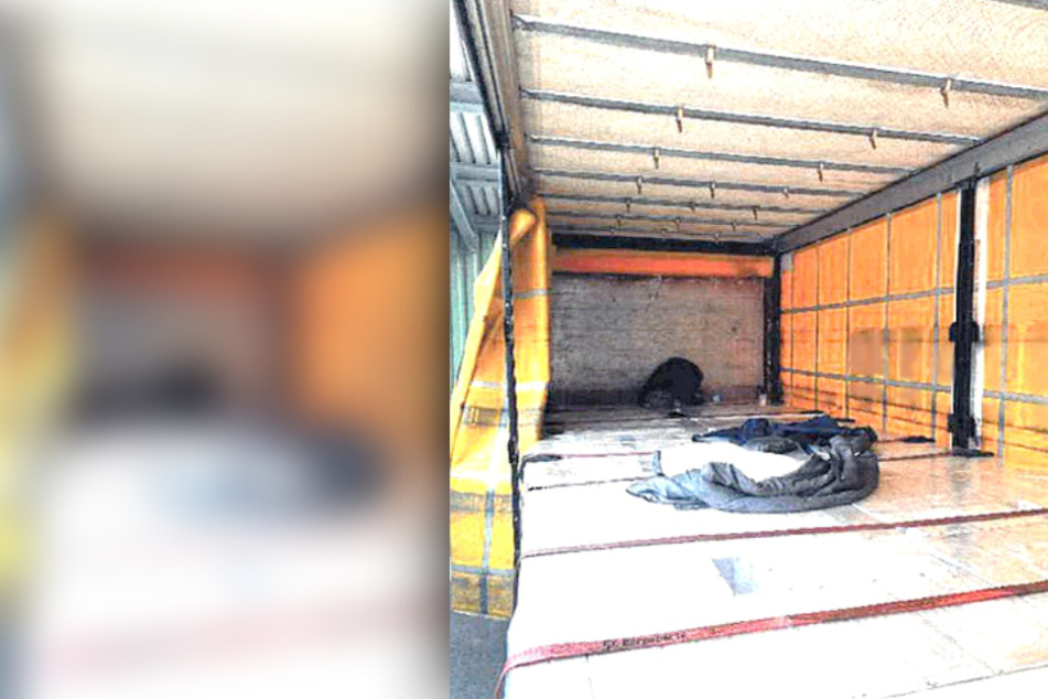 Das Foto der Polizei zeigt das Innere des Lkw-Auflegers, in dem die Migranten ausharrten.