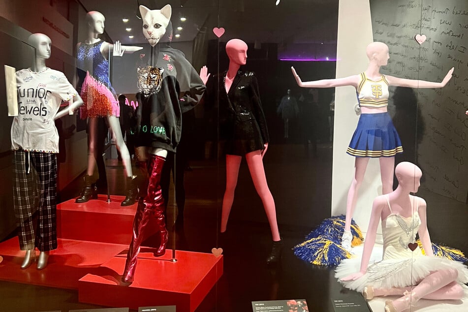 Taylor Swift: Storyteller features notable outfits and props from the singer's many music videos.