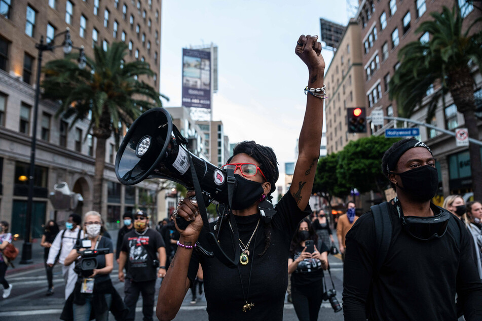 Black Lives Matter protesters marched in LA on the one-year anniversary of George Floyd's murder.