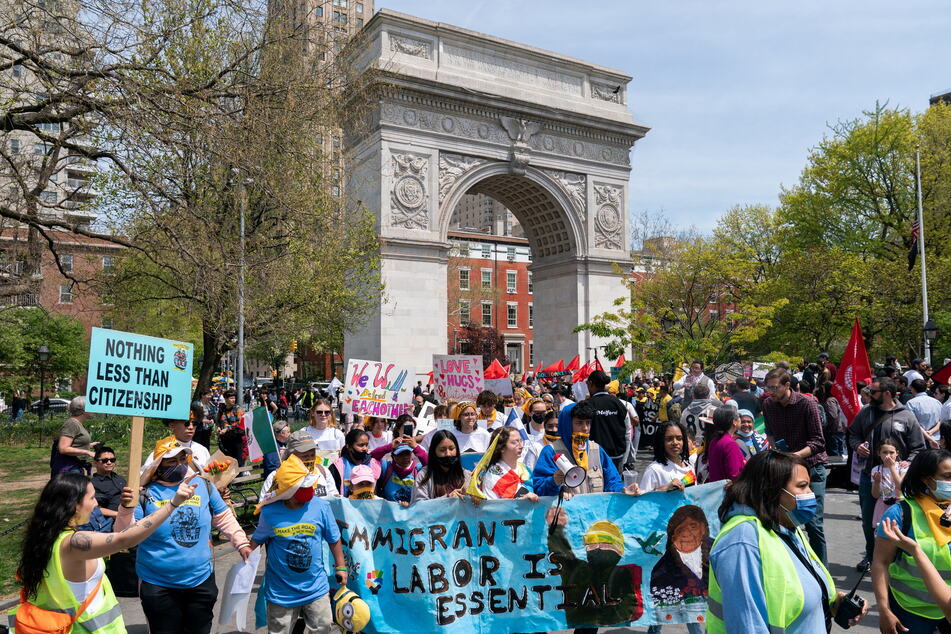 Workers across industries gathered at Washington Square Park in New York City to demand greater workplace protections and a pathway to citizenship.