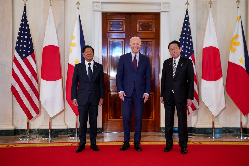 President Joe Biden (c.) hosts Philippine President Ferdinand Marcos Jr. (l.) and Japan Prime Minister Fumio Kishida for a trilateral summit at the White House on April 11, 2024.