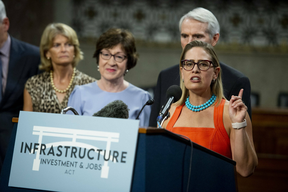 Arizona Senator Kyrsten Sinema is one of the main backers of the $1.2-trillion bipartisan infrastructure deal but has expressed trepidation over the $3.5-trillion Democratic-only proposal.