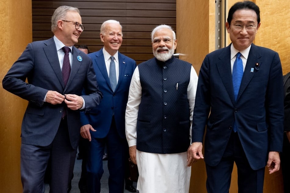 From l. to r.: Australian Prime Minister Anthony Albanese, US President Joe Biden, Indian Prime Minister Narendra Modi, and Japanese Prime Minister Fumio Kishida arrive for their meeting during the Quad Leaders Summit in Tokyo on May 24, 2022.