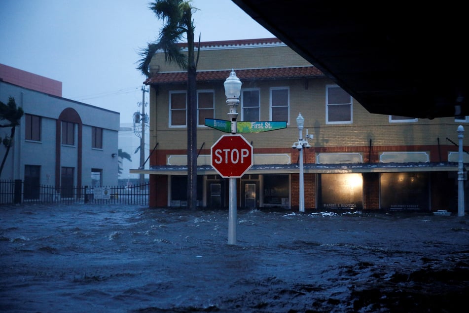 A flooded street is seen in downtown Fort Myers as Hurricane Ian makes landfall in southwestern Florida.