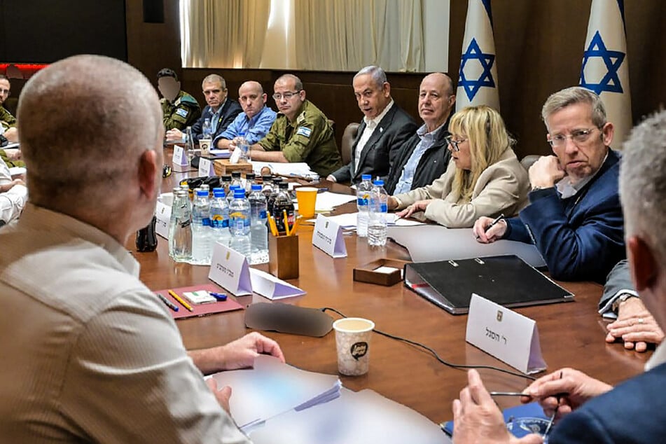 Israel's security cabinet approved in a vote on Friday a Gaza ceasefire and hostage release deal that should take effect this weekend, the prime minister's office said.