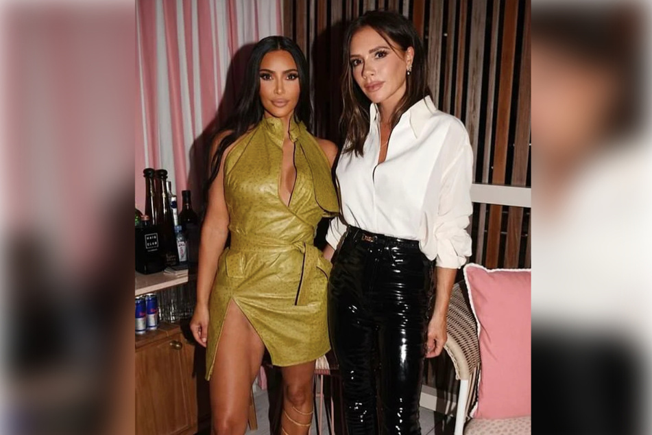 Kim Kardashian posed with friend Victoria Beckham at the Miami party on Friday.