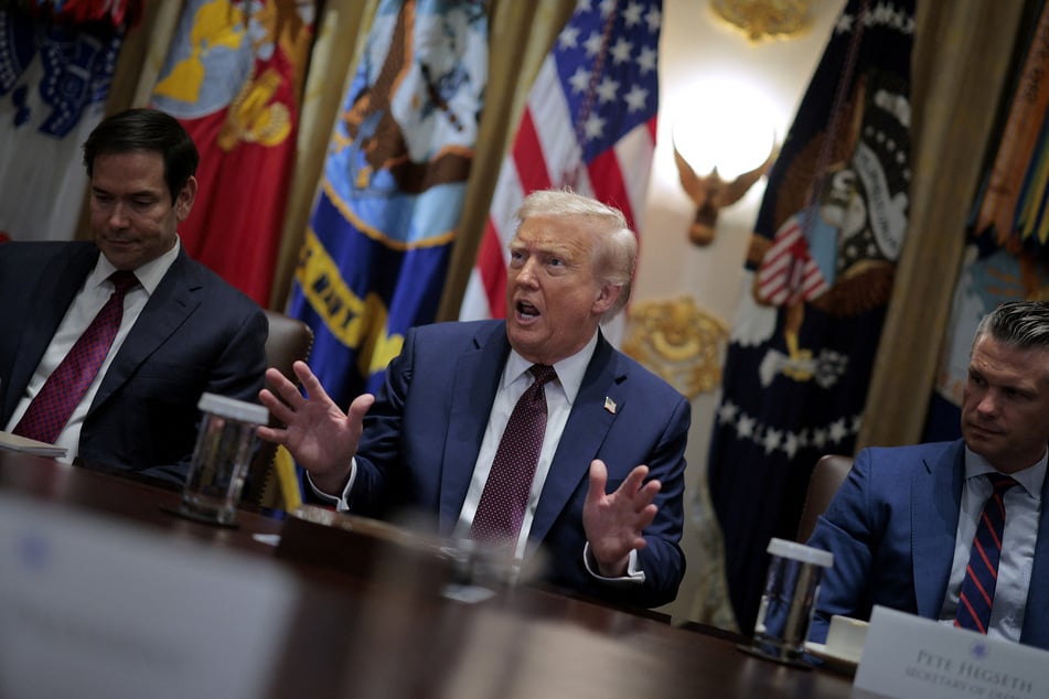President Donald Trump (r.) ranted and raved about scratched limestone in the White House Rose Garden.