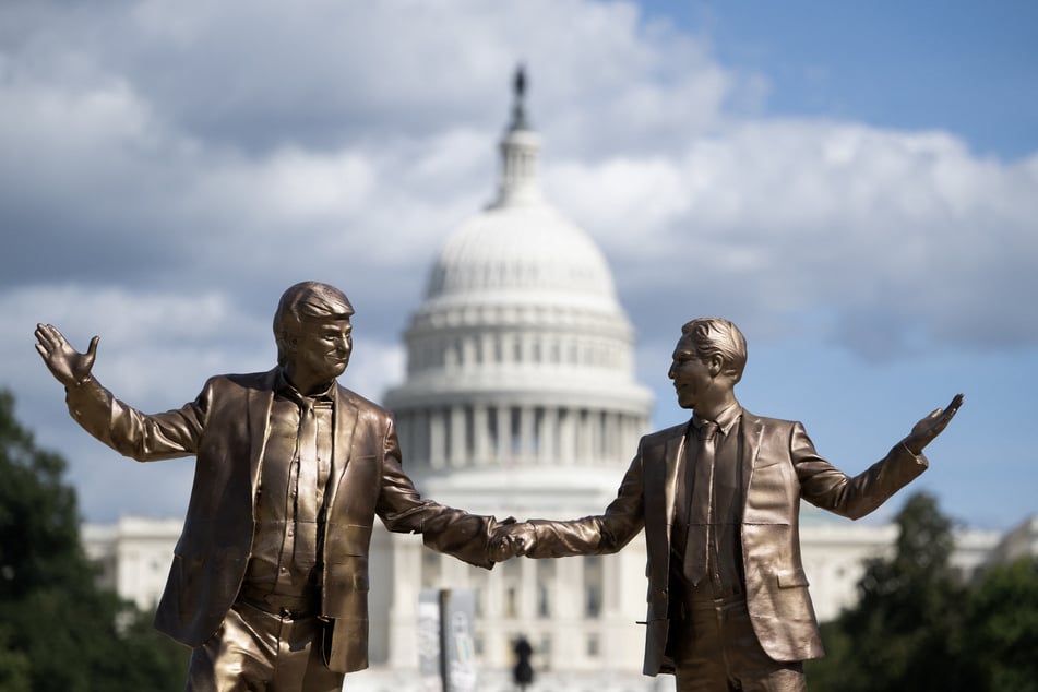 A statue depicting US President Donald Trump and Jeffrey Epstein holding hands is seen near the US Capitol on October 2, 2025, in Washington, DC.