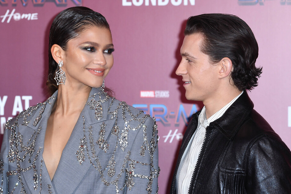 Zendaya (l.) shared the hilarious tale of the time she and Tom Holland evaded a speeding ticket.