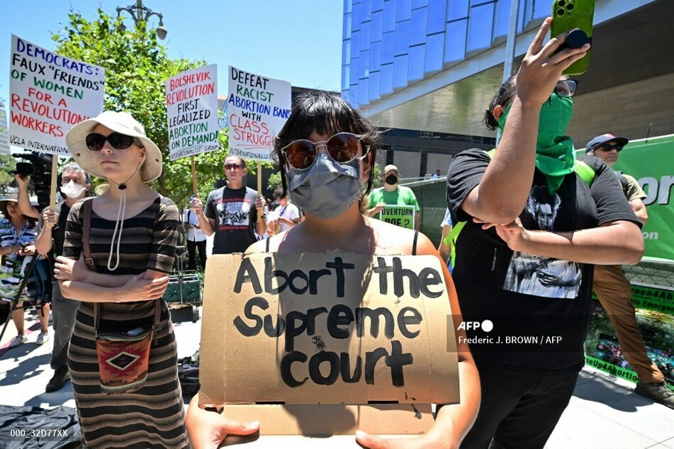 Protests have broken out across the US as people voice their outrage over the Court's decision.