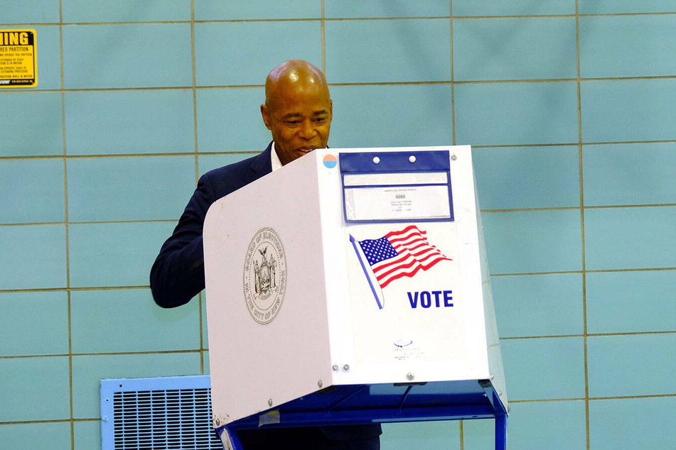Eric Adams votes for himself to become the next mayor of New York City.