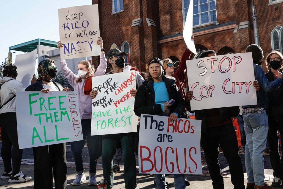 Dozens gather in support of the 61 Stop Cop City activists being indicted for racketeering at Fulton County Courthouse in Atlanta, Georgia, on November 6, 2023.