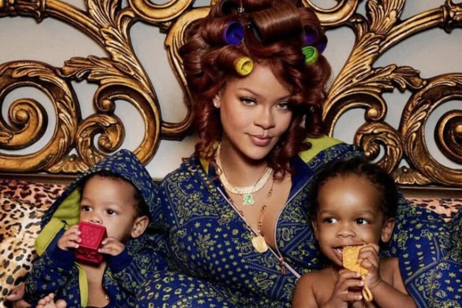 Rihanna (c.) defended her sons RZA (r.) and Riot Rose after a fan criticized their names.