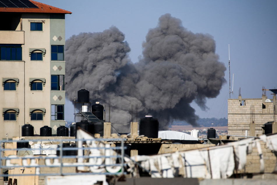 Smoke billows from Israeli strikes in Rafah in the southern Gaza Strip on Tuesday amid the ongoing conflict between Israel and the Palestinian militant group Hamas.