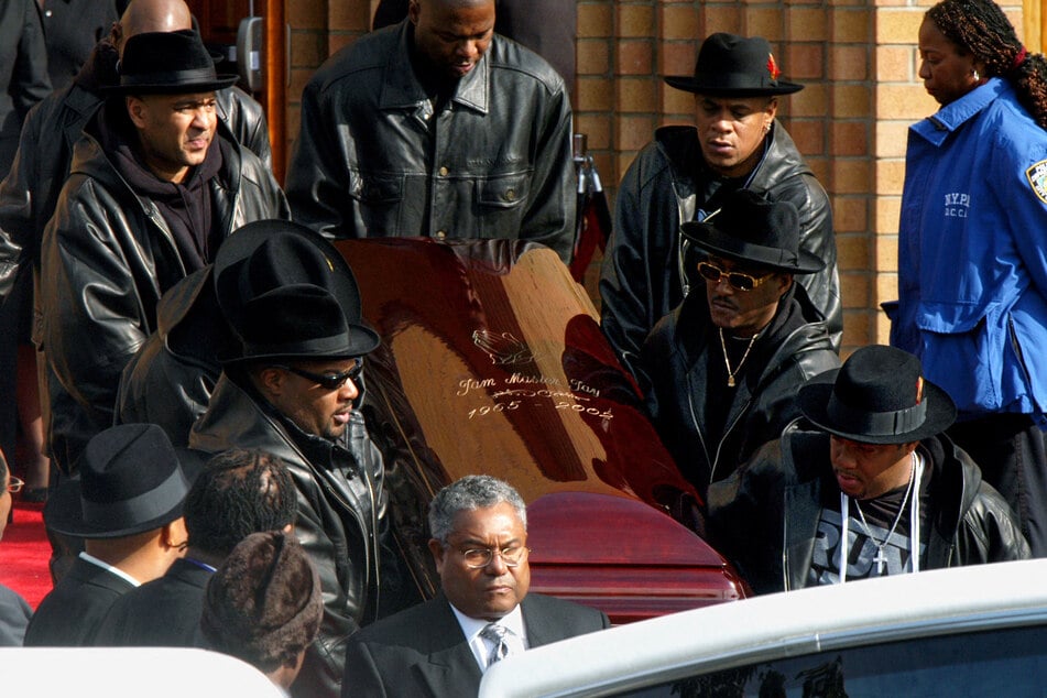 The coffin of Run DMC's Jam Master Jay, nee Kevin Mizell, is carried out of Allen A.M.E Cathedral after his funeral November 5, 2002.