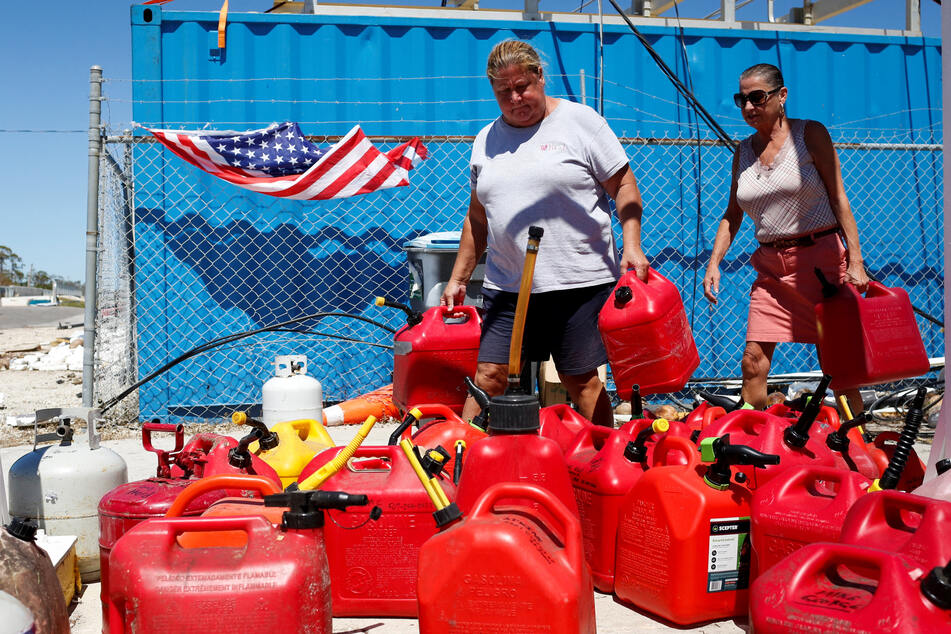 Residents were looking to fill up gas at a distribution center organized in a community in Florida after Hurricane Ian caused widespread destruction.