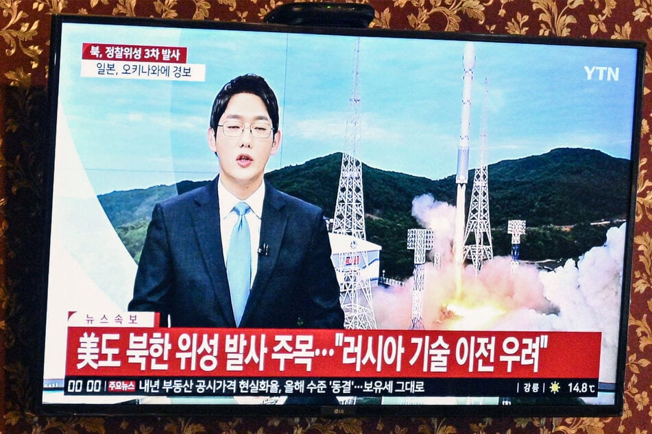 A South Korean news broadcast on Wednesday discussed North Korea's firing of what it claims is a military spy satellite.
