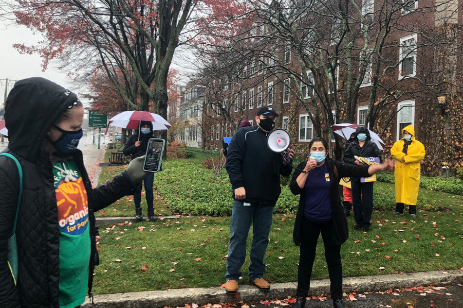 Doris speaks at a rally demanding equal rights and fair treatment for Harvard custodial workers.