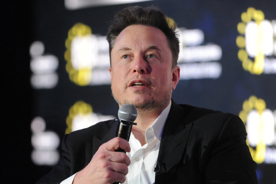 Elon Musk embarked on a tour of Auschwitz on Monday as he defended X against accusations of antisemitism.