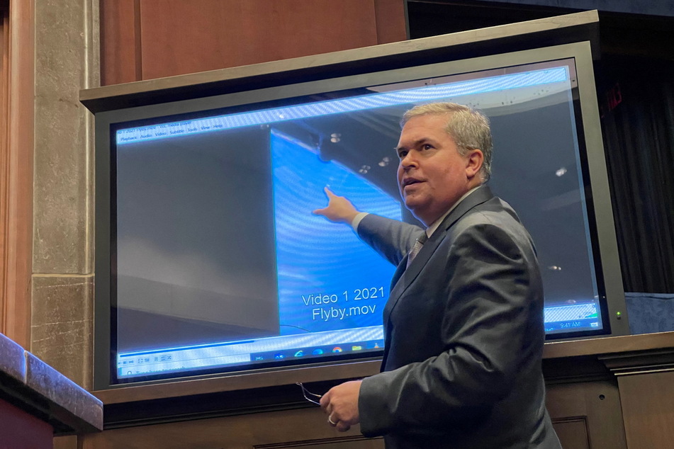 Scott Bray, deputy director of Naval Intelligence, pointing at "unidentified aerial phenomena" during a hearing with members of the House Intelligence Committee.