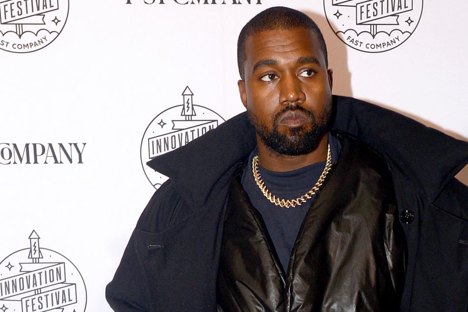 Kanye West is being investigated for battery after he tossed the cell phone of a woman filming him.