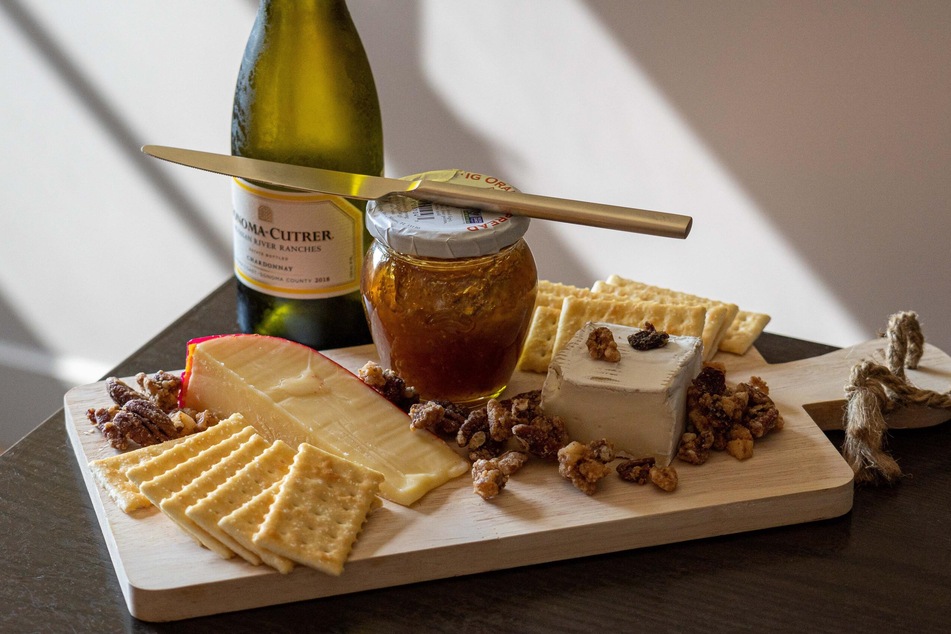 Manchego cheese pairs well with just about anything you could possibly add to a charcuterie board!