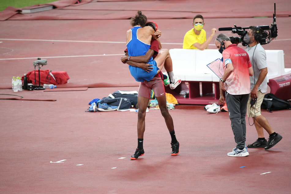 The moment Tamberi and Barshim were declared joint-winners of the high-jump.