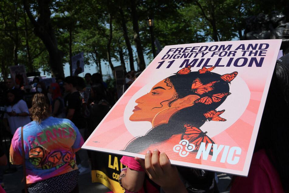 People gather for a rally to celebrate the 10th anniversary of the Deferred Action for Childhood Arrivals (DACA) in Battery Park on June 15, 2022 in New York City.