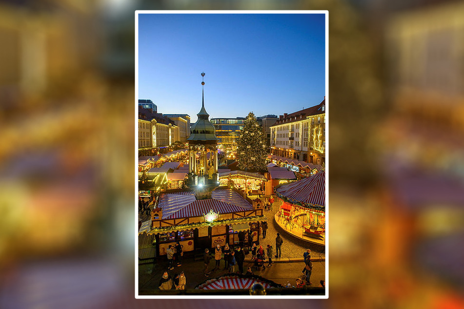 Blick nach Magdeburg: Die Lichter der Buden des Weihnachtsmarktes auf dem Alten Markt brennen. Zugang gibt's allerdings nur mit 2G-Zertifikat.