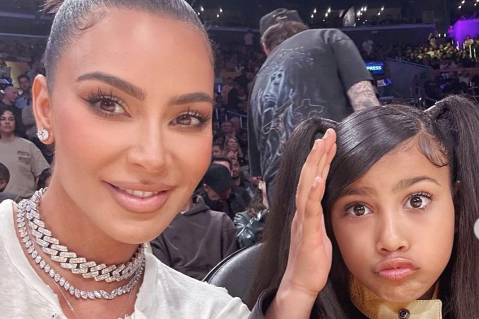 Kim Kardashian (l.) showed off her jump-roping skills with the help of North West.
